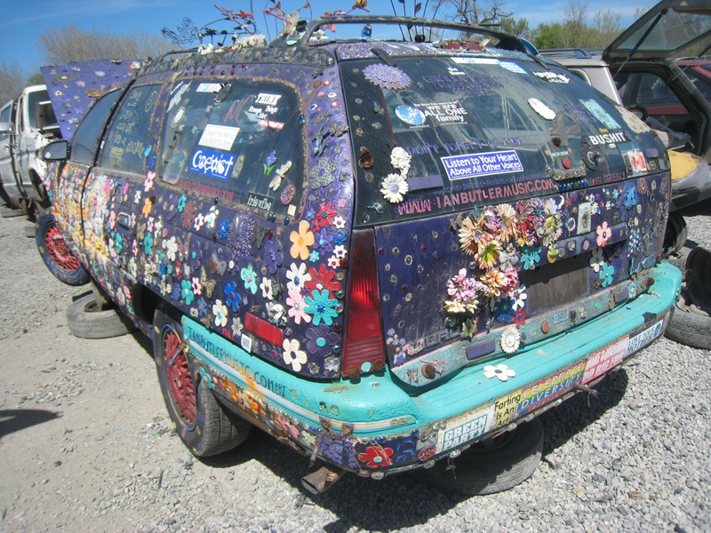 Illustration for article titled Groovalicious Purple Princess Of Peace Art Car Falls On Hard Times, Faces Crusher